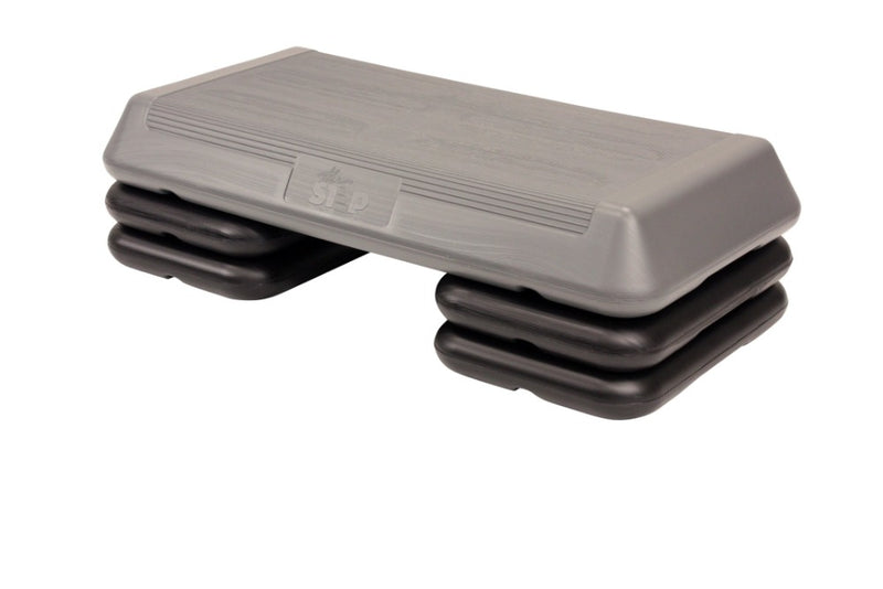 The Step Circuit Size Platform with Four Freestyle Risers from Lifeline Fitness for Step and Aerobic Exercise, in Grey compared to Gear Lab. 