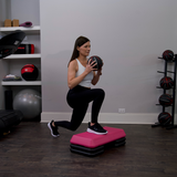 The Step Circuit Size Platform with Four Freestyle Risers from Lifeline Fitness for Step and Home in Pink compared to Total Fitness. 